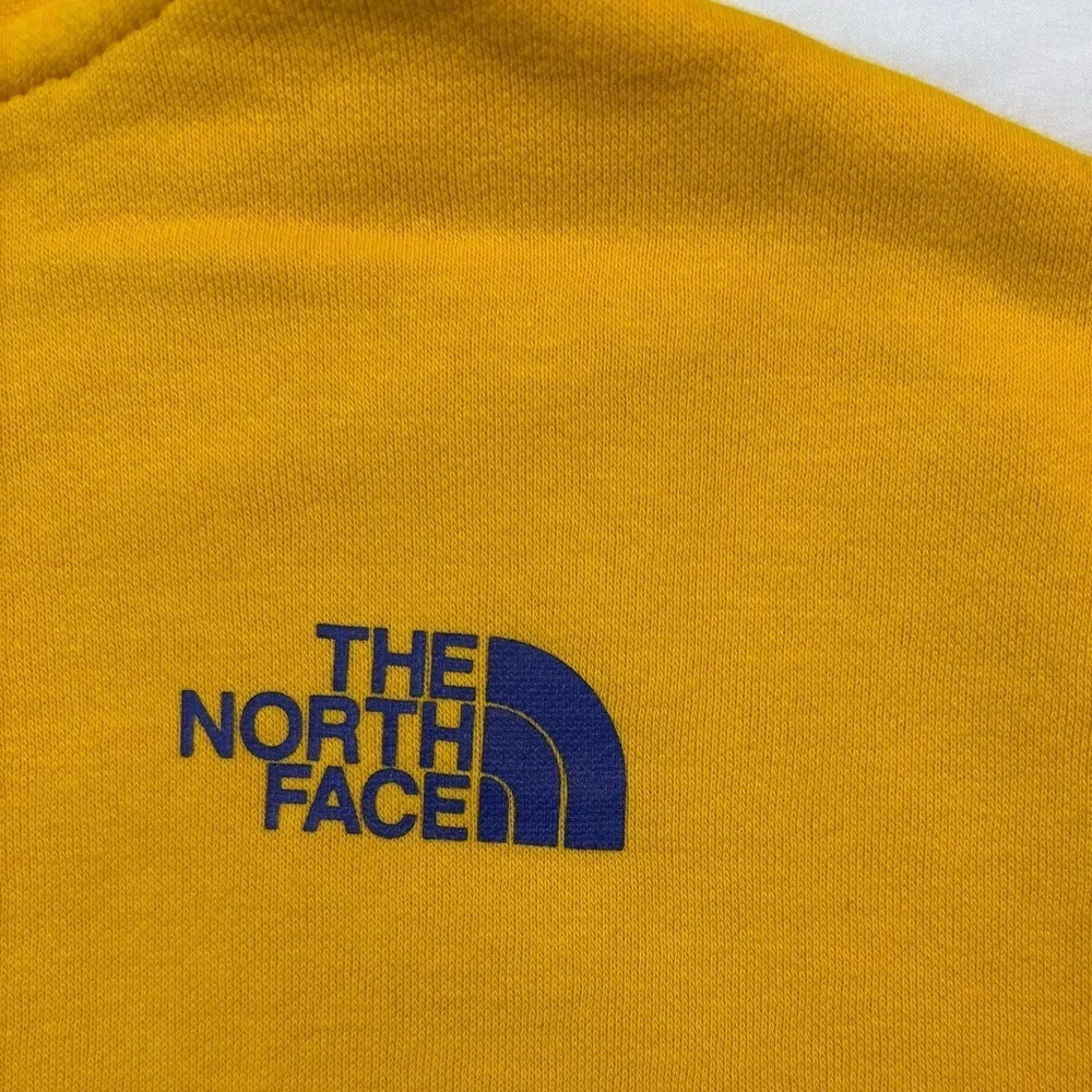 The North Face bright yellow